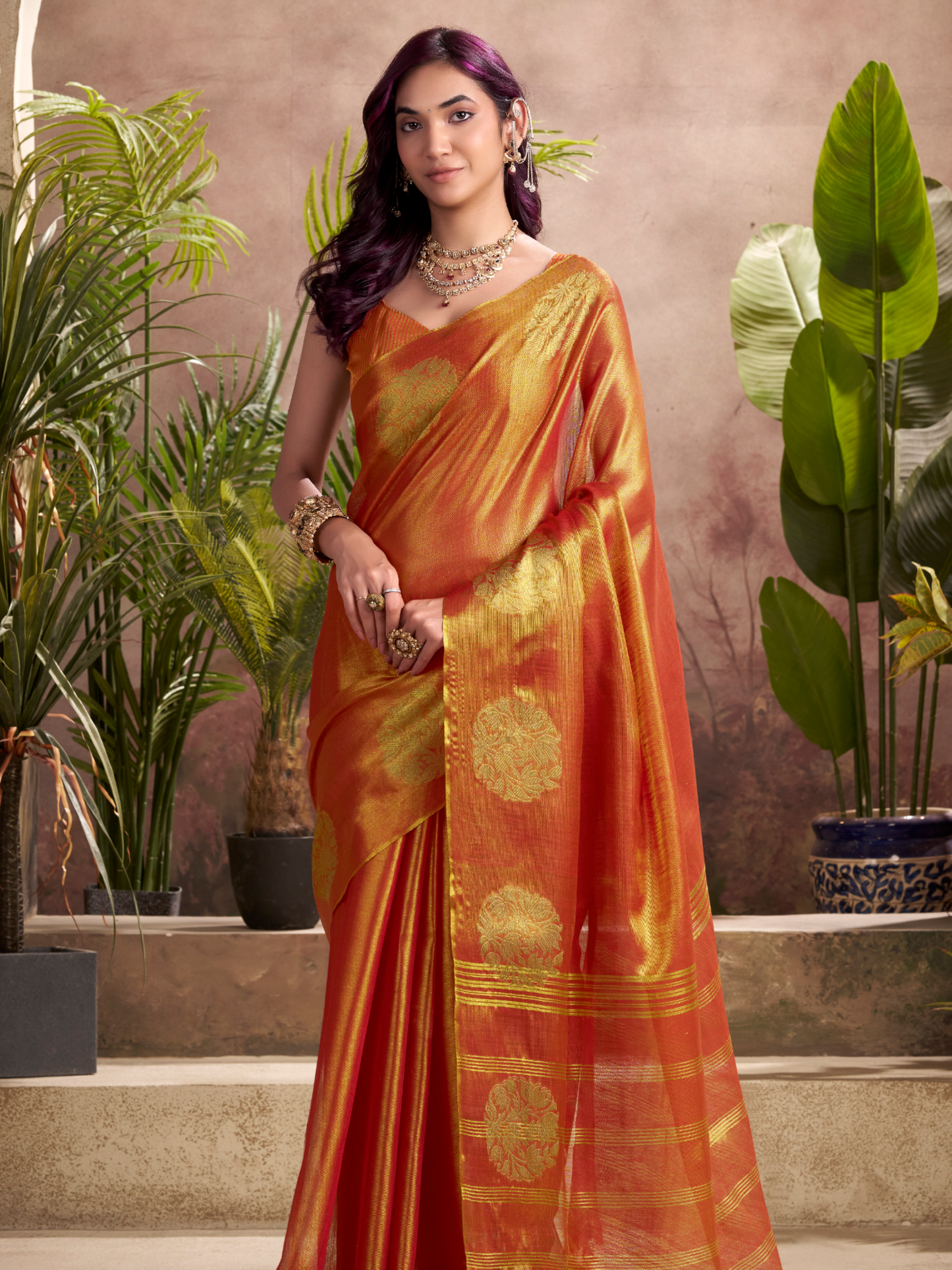 which jewelry suits on orange saree