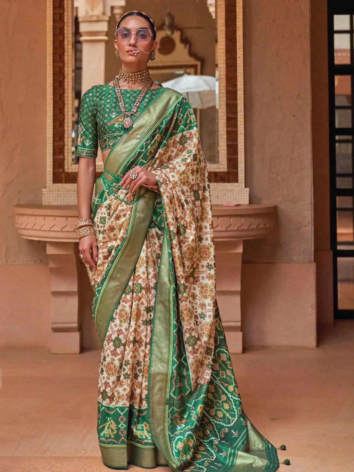Beige and Green Patola Saree
