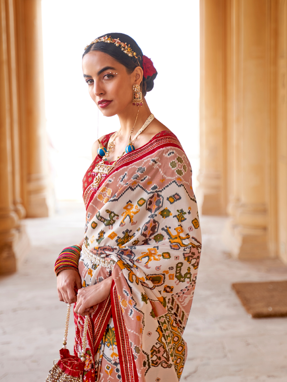 Alluring White Patola Silk Saree