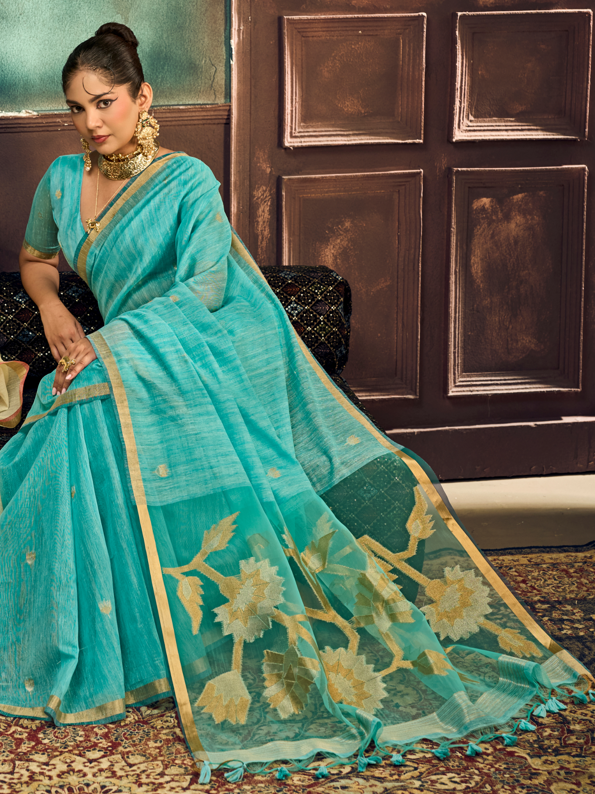 royal woman in sky blue shade saree