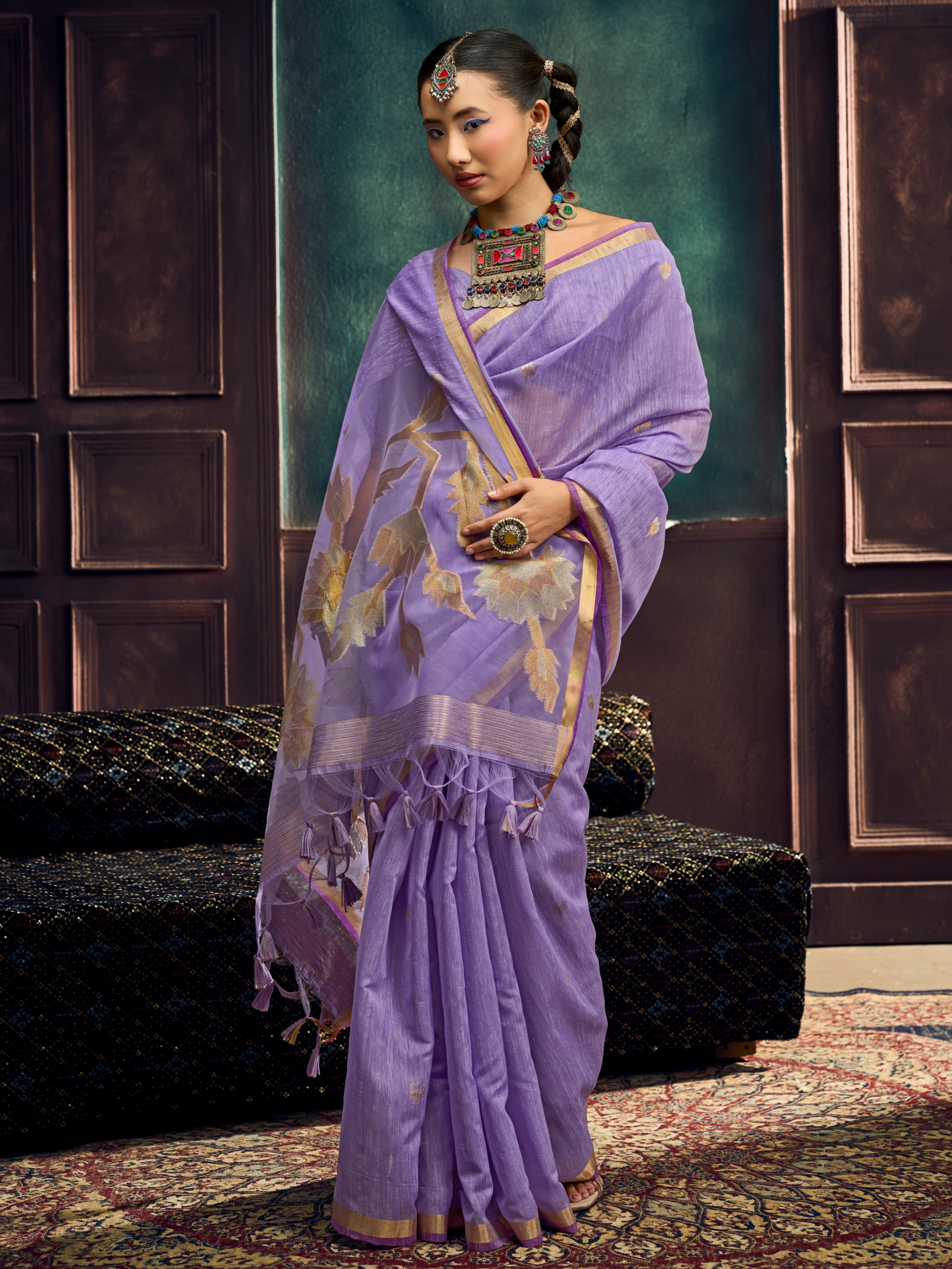 royal woman in lavender shade saree