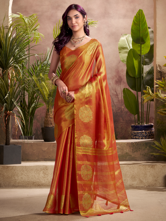 women in an orange tissue saree