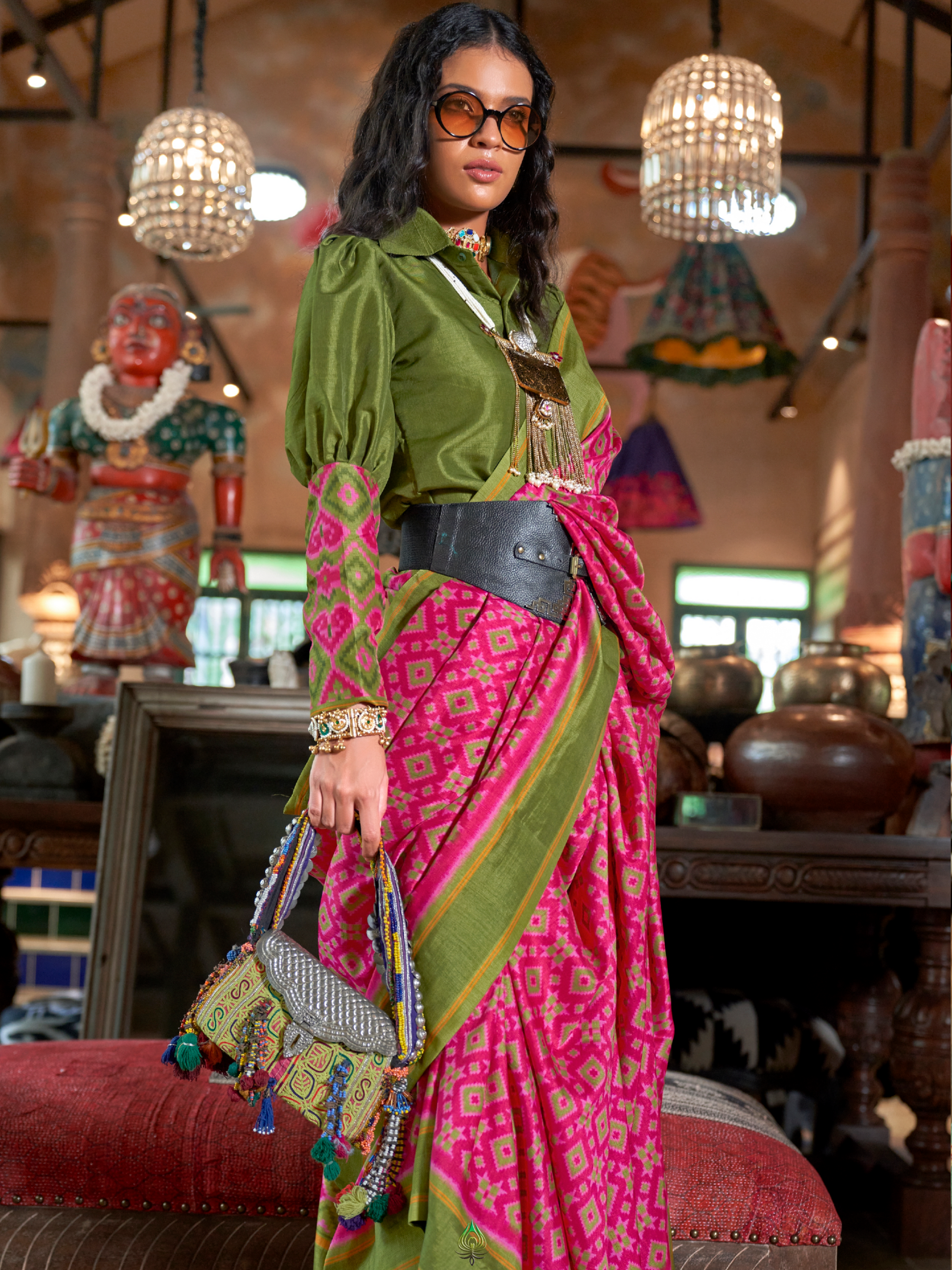 women wearing pink patola saree