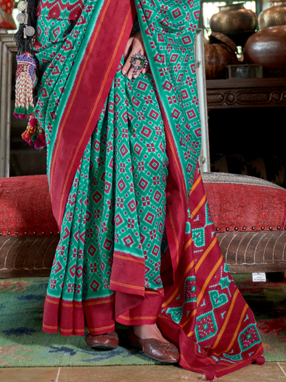 blue with red patola saree