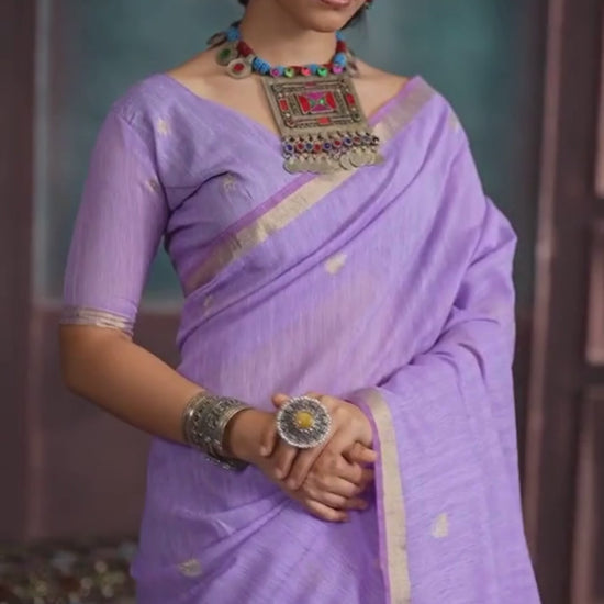 woman in lavender shade saree with jewellery
